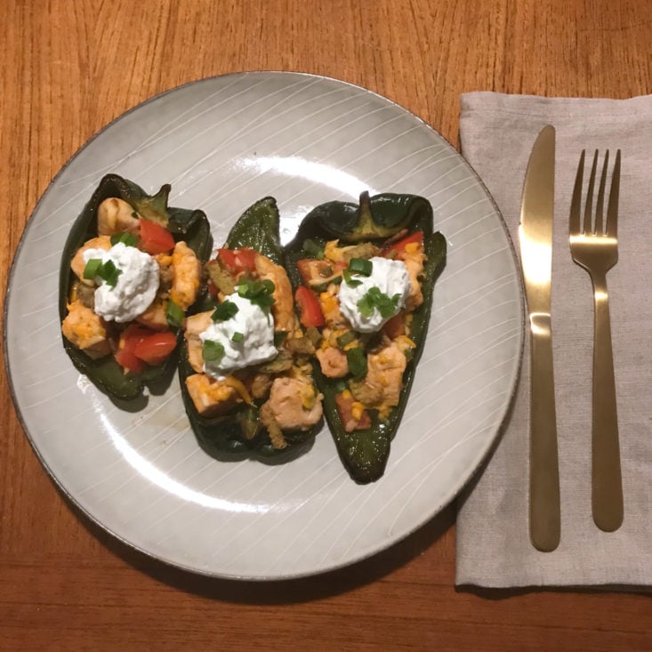 plated Buffalo Chicken Stuffed Peppers with blue cheese cream