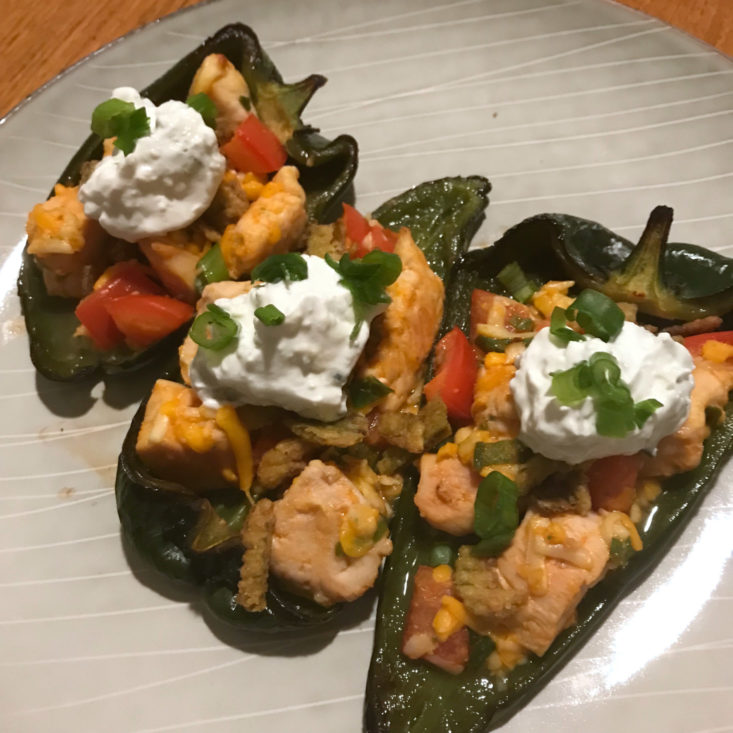 close up of Buffalo Chicken Stuffed Peppers with blue cheese cream