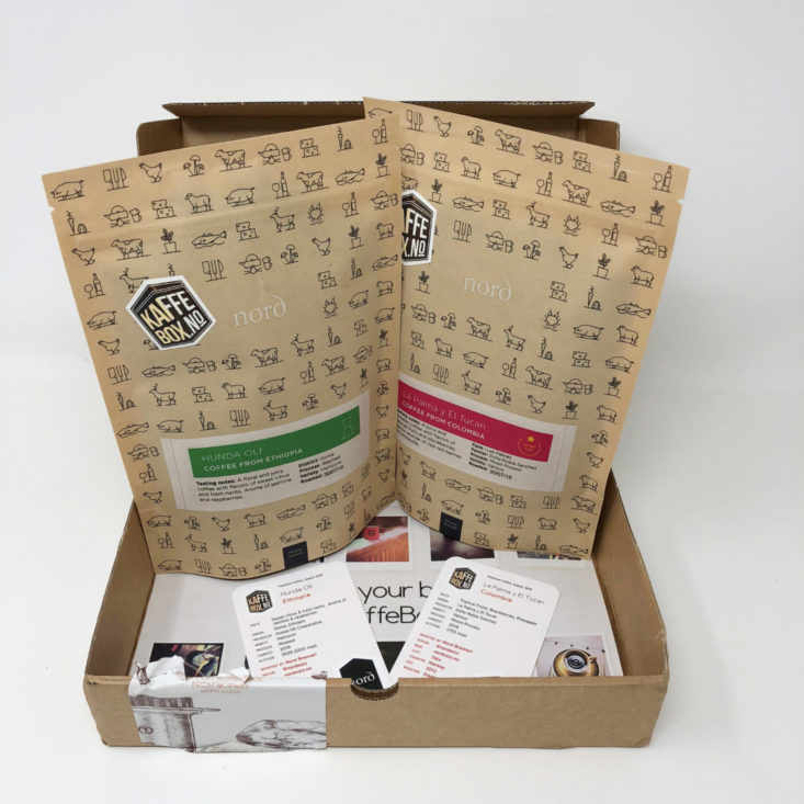 open KaffeeBox box with two coffee pouches inside