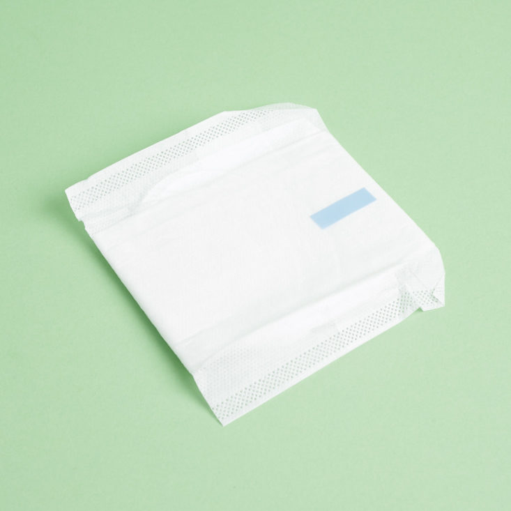 folded up Dollar Maxi Pad Club Heavy Absorbency Pad with Wings