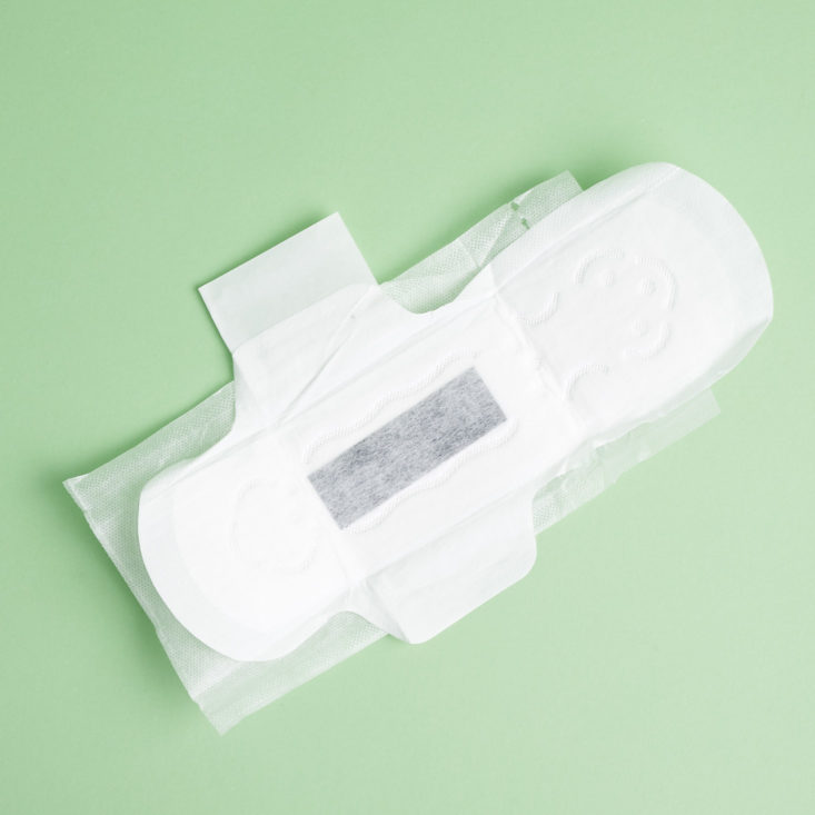 unfolded Dollar Maxi Pad Club Heavy Absorbency Pad with Wings