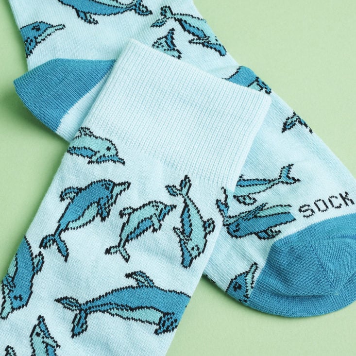 close up of Dolphin patterned socks