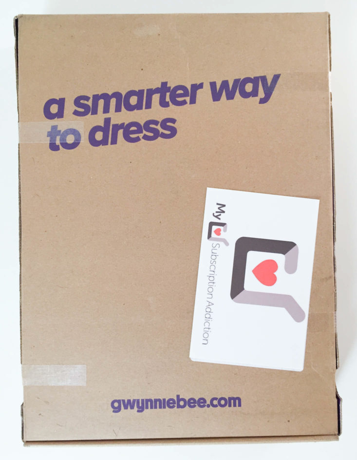 closed cardboard box with "a smarter way to dress"