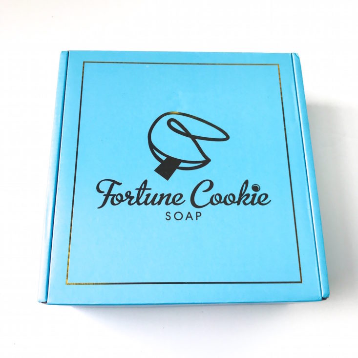 closed blue box with Fortune Cookie Soap printed in black on top