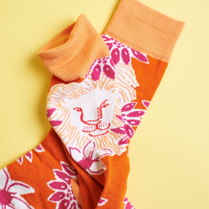 Orange Floral Socks with secret Lion