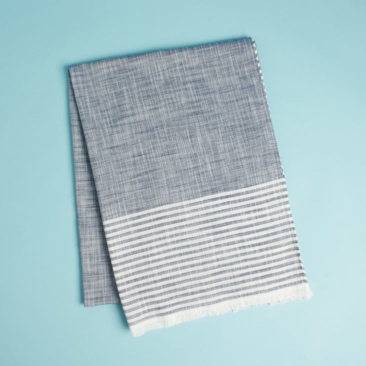 causebox welcome box gray striped scarf folded