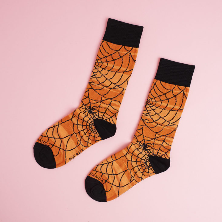 other side of orange and black spider web socks