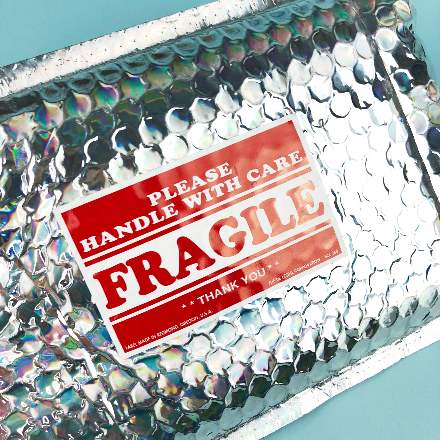 fragile sticker on package