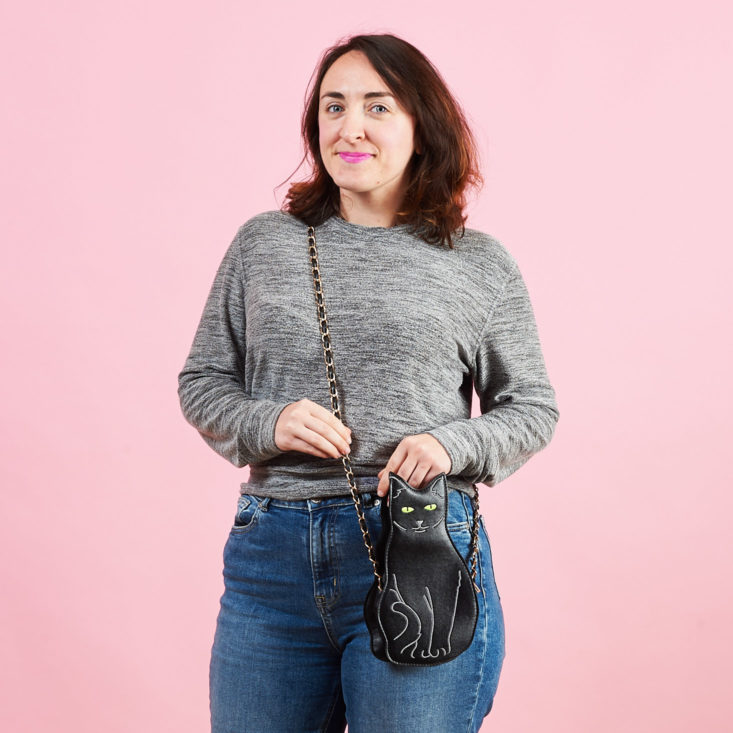 Quirky Crate cat purse on model