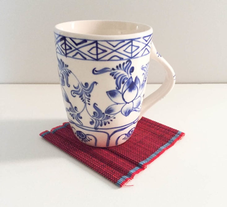 The Alignist Winter 2019 - Blue Floral Tea Mug Front On Bamboo Coaster Front