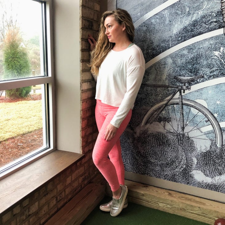 White top and bright pink workout leggings from Yoga Club