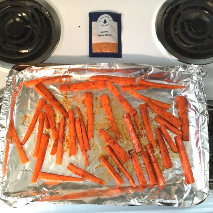 seasoned carrots on sheet pan