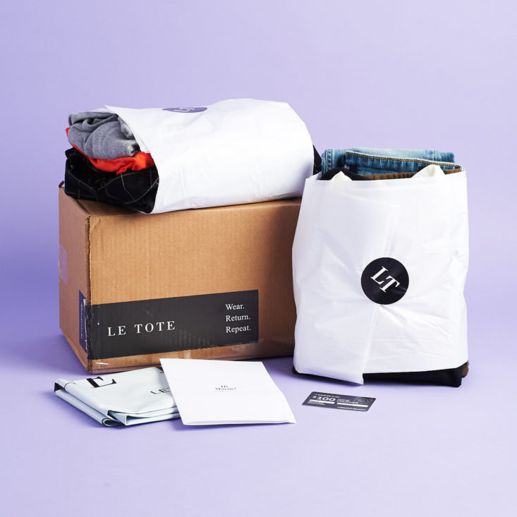 Wrapped Clothing surrounding Le Tote box