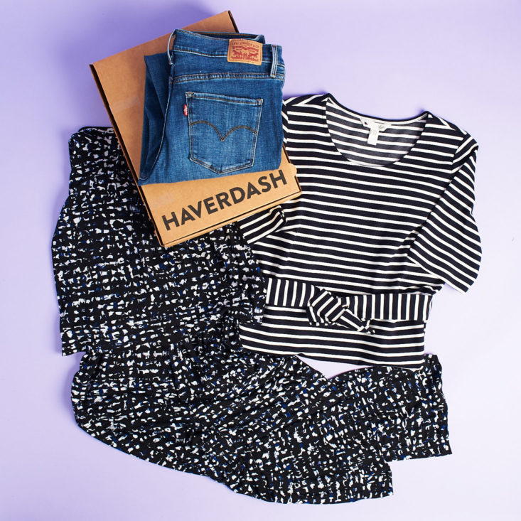 three clothing items surrounding haverdash box